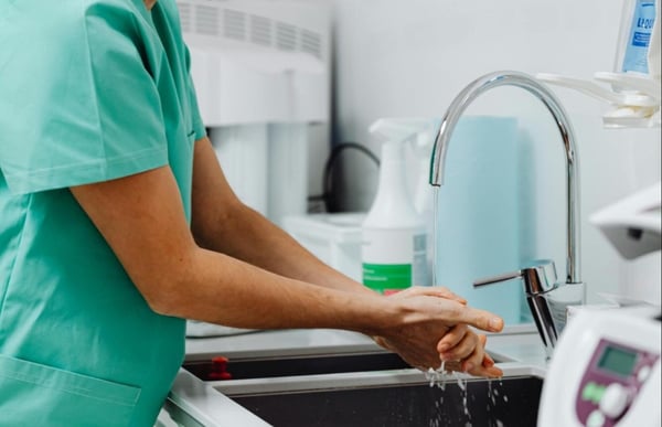 Healthcare professional washing their hands